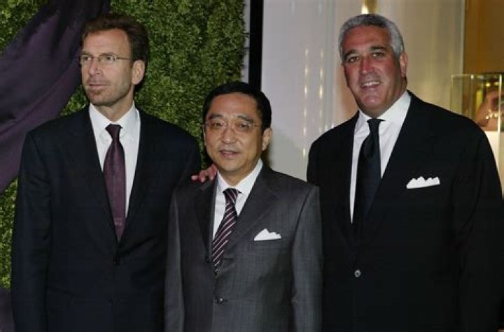 Meet The Two Hidden Billionaires Who Own Michael Kors, Jimmy Choo And Now Versace